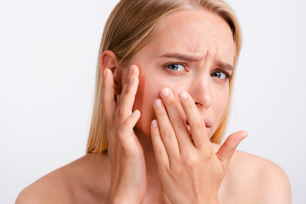 Viso femminile con incarnato stanco e spento